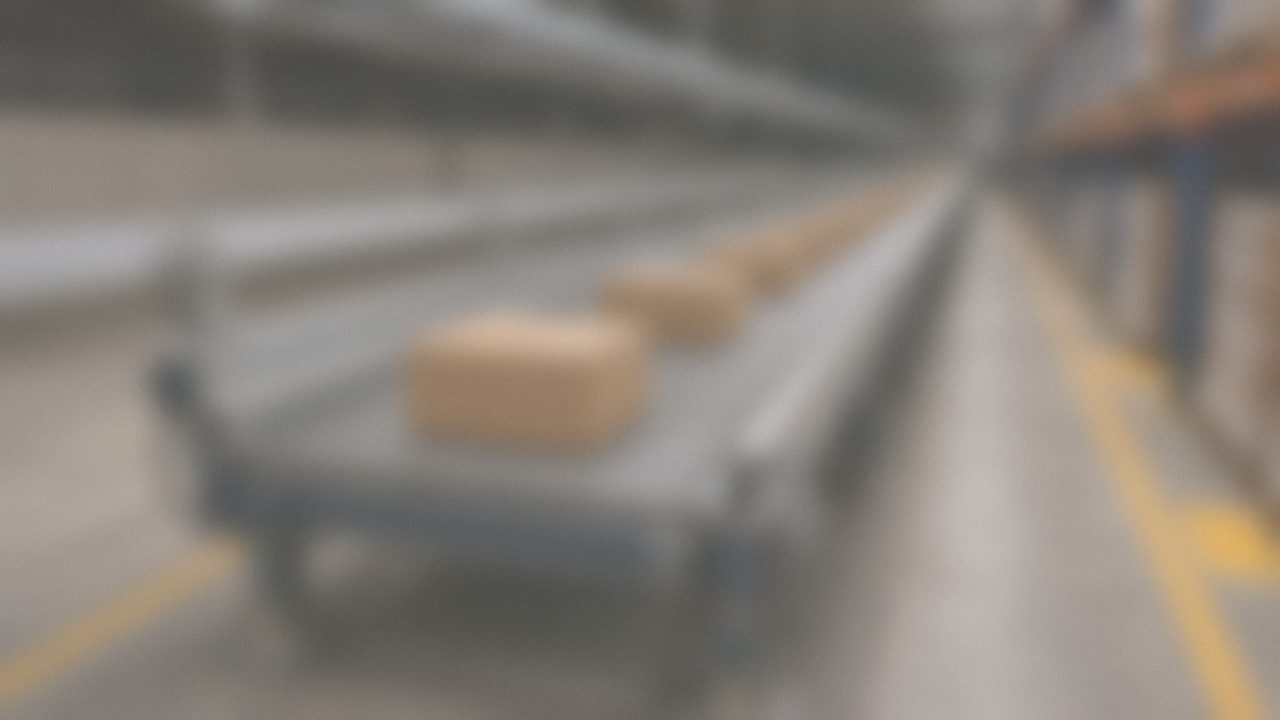 Automated conveyor line with photoeyes and motor drives
